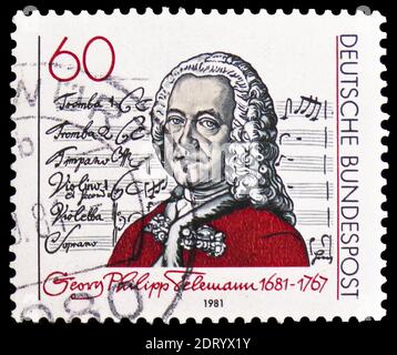 MOSCOW, RUSSIA - FEBRUARY 21, 2019: A stamp printed in Germany, Federal Republic shows Georg Philipp Telemann and title page of “Singet dem Herrn” Can Stock Photo