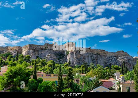 under the sacred rock of the acropolis in athens Stock Photo