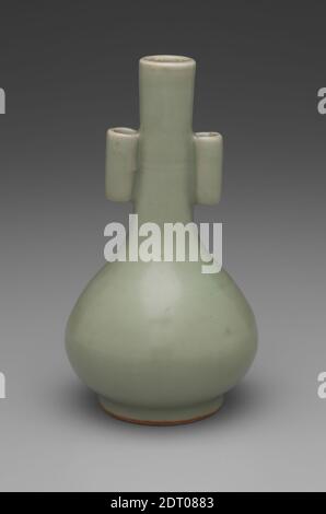 Vase, 12th–13th century, Stoneware with green glaze (Longquan ware), 6 5/8 × 3 5/8 in. (16.8 × 9.2 cm), The two nonfunctional knobs on the sides of this vase likely reference metal vessels of this shape that were used for a game known as touhu, in which arrows were shot into the neck of a vase and its two narrow openings at the sides. , China, Chinese, Southern Song dynasty (1126–1279), Containers - Ceramics Stock Photo