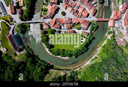 The soccer field of Fribourg and the Sarine river seen from above, Switzerland. Stock Photo