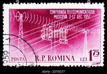 MOSCOW, RUSSIA - FEBRUARY 21, 2019: A stamp printed in shows Shortwave masts and telegraph line, Telecommunications Conference, Moscow serie, circa 19 Stock Photo