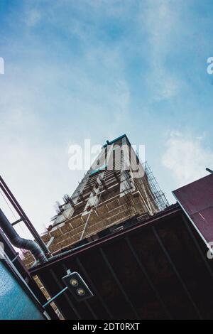 Low angle of a newly constructed building under a cloudy sky Stock ...