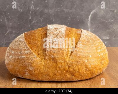 Freshly baked bread at home. Fresh and crispy bread as background with place for text Stock Photo