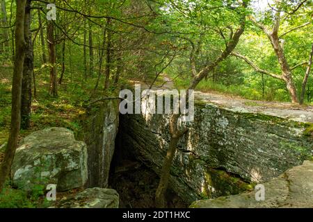 Natural stone bridge on the hiking trail at Bell Smith Springs, Shawnee National forest, Illinois. Stock Photo