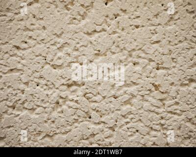Close-up of the surface of an old white painted plaster wall Stock Photo