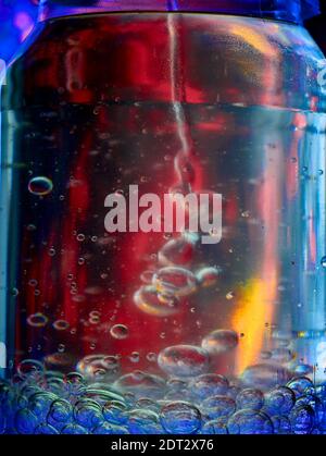 Brightly coloured abstract with bubbles caused by a chemical reaction Stock Photo