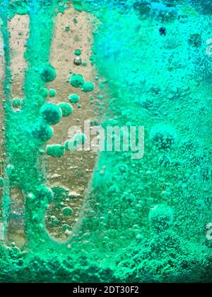 Brightly coloured abstract with bubbles caused by a chemical reaction Stock Photo