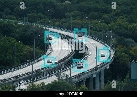 Cars move on city road and Artificial Intelligence controls vehicles in traffic. Autonomous Self Driving Cars Concept. Stock Photo
