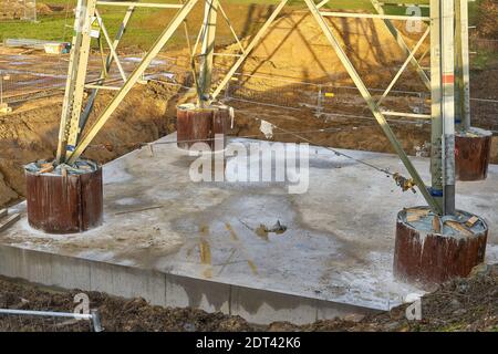 High voltage pylon, maintenance, foundation works, reinforcing Stock Photo