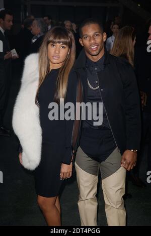 Victor Cruz and his wife Elaina Watley arriving at Givenchy collection presentation as part of the Men s Fall Winter 2014 2015 Paris Fashion Week held at La Halle Freyssinet in Paris France on January...