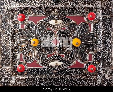 Brass moroccan decoration in furniture item. Richly decorated Stock Photo