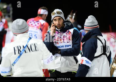 Martin Fourcade of France speaks on his mobile phone after the Men's Individual 20 km during day six of the Sochi 2014 Winter Olympics at Laura Cross-country Ski & Biathlon Center in Sochi, Russia on February 13, 2014. Photo by Gouhier-Zabulon/ABACAPRESS.COM Stock Photo