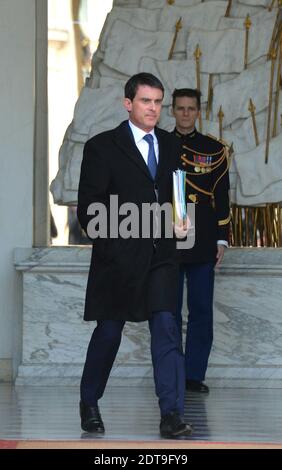 leaving the Elysee Palace after the weekly cabinet meeting, in Paris, France on March 26, 2014. Photo by Christian Liewig/ABACAPRESS.COM Stock Photo