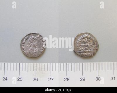 Ruler: Honorius, Flavius, Emperor of Rome, A.D. 384–423, ruled 393–423, Mint: Mediolanum, 1 Siliqua of Honorius, Flavius, Emperor of Rome from Mediolanum, 388–93, Silver, 1.40 g, 6:00, 15.5 mm, Made in Mediolanum, Roman, 4th century, Numismatics Stock Photo