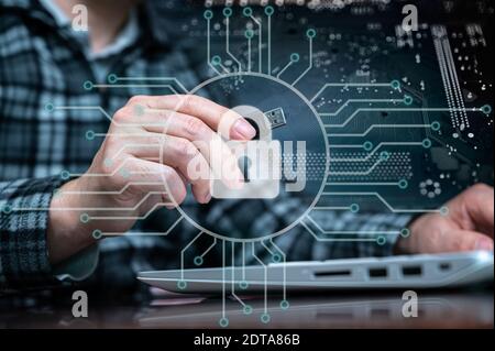 The hand of a person using a USB memory. Cyber Information Protection Concept. Stock Photo