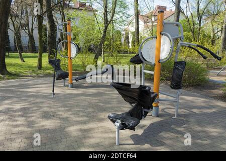 Access to sports grounds in a public park is prohibited. Preservation of exercise machines and sports zones. Stock Photo