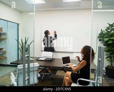 Two businesswomen working in office Stock Photo