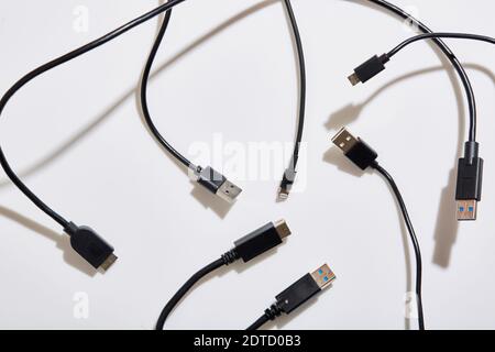 USB cables on white background Stock Photo