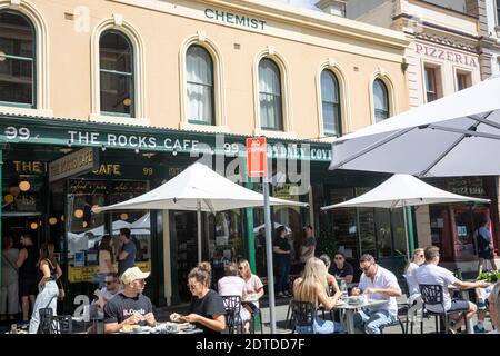 Sydney the Rocks area and people relaxing at a cafe restaurant on a summers day,Sydney,Australia Stock Photo