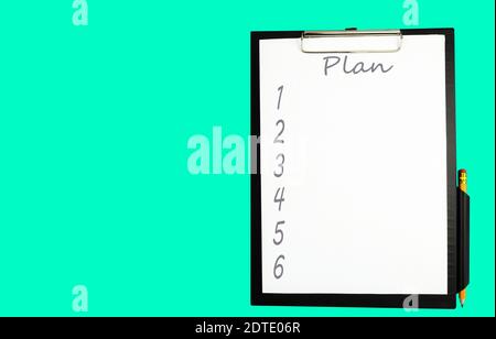 Folder tablet for paper on an isolated background. Folder tablet for paper with pencil for text Stock Photo