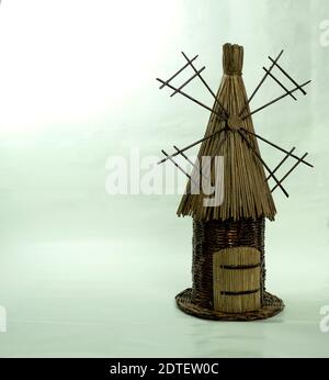 Handmade crafts from old newspapers side view. Bottle stand Stock Photo