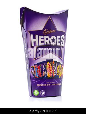SWINDON, UK - DECEMBER 21, 2020: Box of Cadburys Heroes Christmas chocolates on a white background.