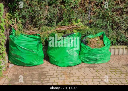 Three trash bags with garbage. Garbage sorting Stock Photo