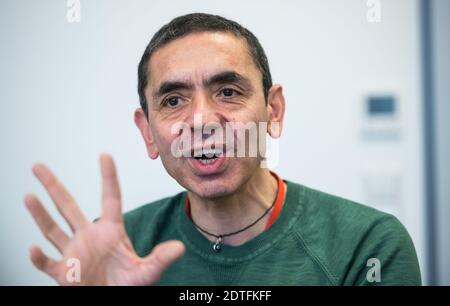 Mainz, Germany. 27th Nov, 2019. Ugur Sahin, CEO of Biontech, gestures during the interview. According to company CEO Ugur Sahin, the Corona vaccine produced by Mainz-based Biontech is in all likelihood also capable of effectively combating the new mutation of the virus that has now emerged in the UK. Credit: Andreas Arnold/dpa/Alamy Live News Stock Photo