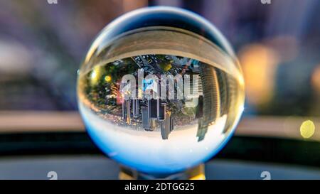 Istanbul, Turkey - September 2019: Istanbul cityscape in a clear glass crystal ball. Levent is the finance district of Istanbul with skyscrapers and t Stock Photo