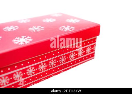 Red festive box on a white background. Stock Photo