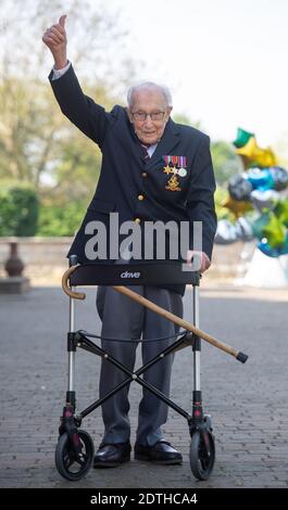 PA REVIEW OF THE YEAR 2020 File photo dated 16/04/20 of 99-year-old war veteran Captain Tom Moore at his home in Marston Moretaine, Bedfordshire, where he achieved his goal of 100 laps of his garden - raising more than 12 million pounds for the NHS. Stock Photo