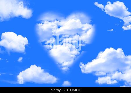 Heart shaped cloud formation on a blue sky day concept Stock Photo