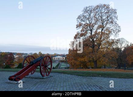 UPPSALA, SWEDEN ON OCTOBER 14, 2013. View from a hill and a cannon. Old gun this side the Botanical Garden. Editorial use. Stock Photo