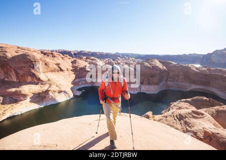 Hike in the Utah mountains. Hiking in unusual natural landscapes. Fantastic forms sandstone formations. Stock Photo