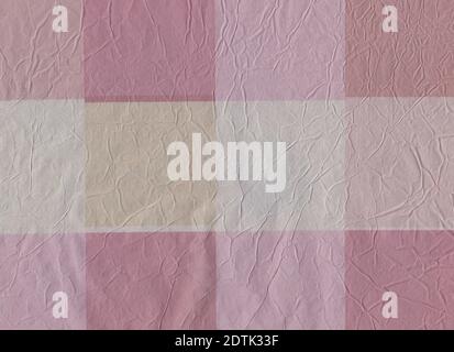 Pink colored crumpled wrapping paper. Checkered. Wrinkled. Creased. Background. Soft colors. Pastel colored. White. Light Yellow. Stock Photo