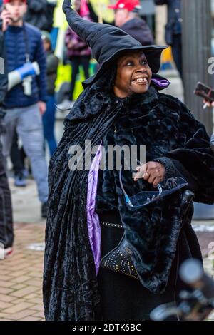 Black woman dressed as a witch for Halloween Stock Photo