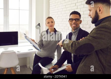 Brainstorming, multiethnic business group team, cooperation concept Stock Photo