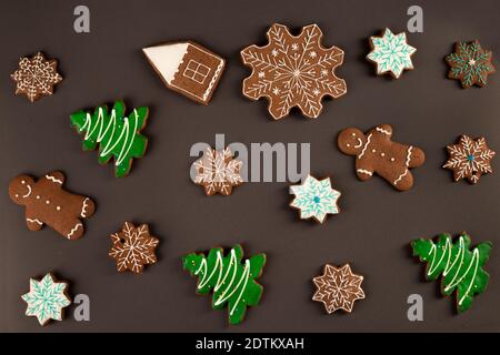 Ginger cookies seamless pattern on brown background Stock Photo
