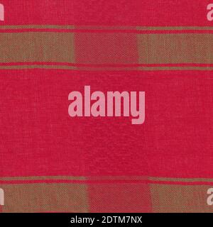 Red and green woven textile. Part of a colored scarf. Stock Photo