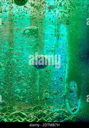 Brightly coloured abstract with bubbles caused by a chemical reaction Stock Photo