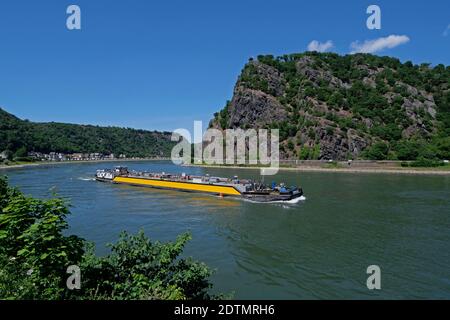 Cargo ship on the Loreley rock near St. Goarshausen, Rhine Valley, Rhineland-Palatinate, Germany Stock Photo