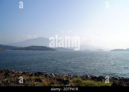 Reservoir of banasura sagar dam in wayanad, Kerala, India. It is the largest earth dam in India and second largest in asia. Stock Photo