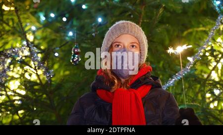 Little Girl In A Christmas Mask On A Light Background, Soft Focus 