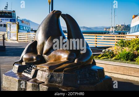 Guardians of the Gate is a 1991 Everdur bronze sculpture by Miles Metzger depicting a family of sea lions located northwest of Pier 39. Stock Photo