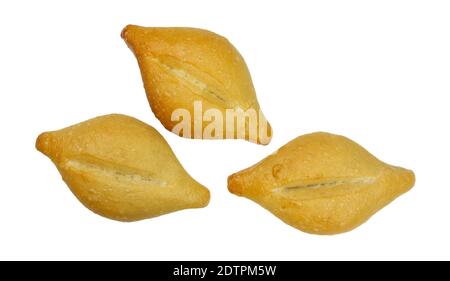 Three freshly baked bolillo bread rolls isolated on a white background. Stock Photo