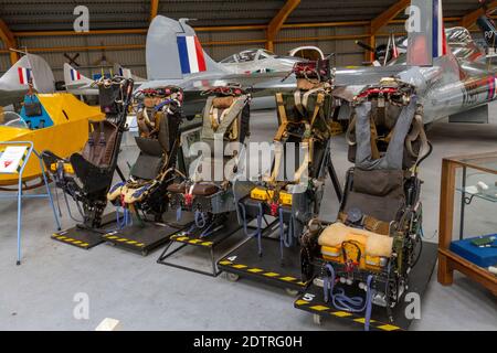 Generational line up of five Martin-Baker ejection seats use don RAF aircraft, Newark Air Museum, near Newark-on-Trent, Nottinghamshire, UK. Stock Photo