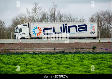 Dorney, UK. 22nd December, 2020. A Culina Food and Drinks logistics HGV on the M4 today. Following the new Covid-19 variant in the South East of England, France have closed their channel ports to UK freight. Despite, this it was business as usual today as there were plenty of freight shipments still being transported on the M4. The action by Emmanuel Macron the President of France may lead to some temporary shortages of imported citrus fruit and vegetables from the EU, however, the French action appears to only be strengthening the campaign to buy British. Credit: Maureen McLean/Alamy Live Stock Photo