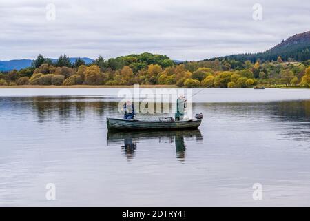 Fishermen fishing for trout on Lake of Menteith in the Trossachs, Scotland, UK Stock Photo