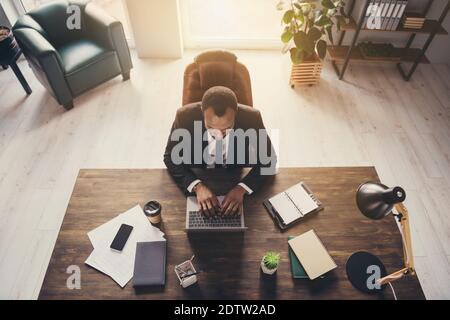 Top above high angle view of his he nice attractive classy chic skilled experienced guy copywriter ceo boss chief executive director sitting in chair Stock Photo