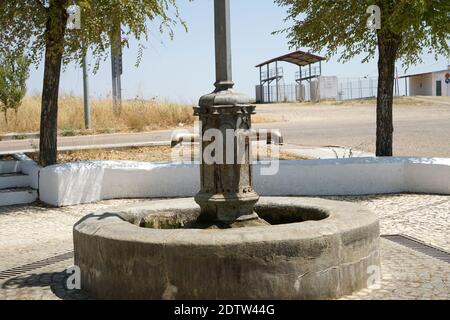 A closeup view of old metal rusty faucets in the water fountain at the park Stock Photo